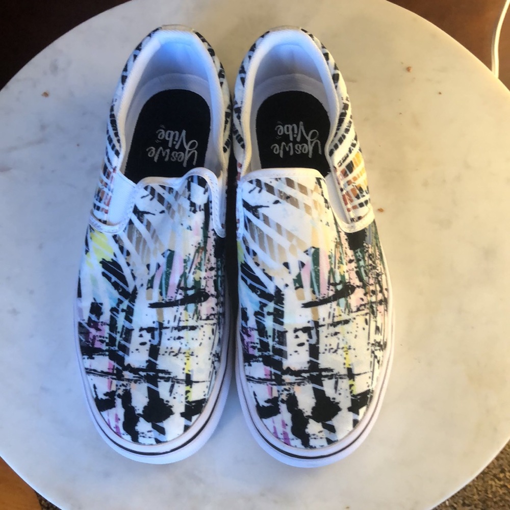 BRAND NEW, NEVER WORN! We Vibe Slip ons in Graphic Graffiti